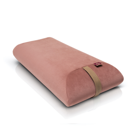 envelope pillow filled with polyurethane foam in a dark pink velour cover