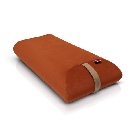 envelope pillow filled with polyurethane foam in a orange velour cover