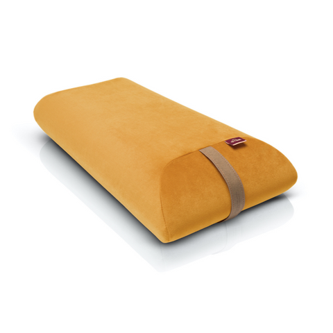 envelope pillow filled with polyurethane foam in a yellow velour cover