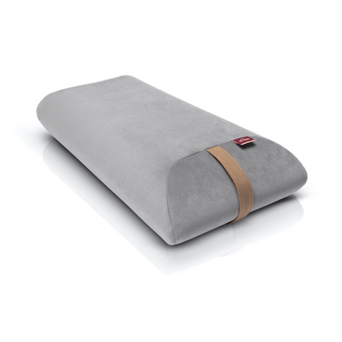 envelope pillow filled with polyurethane foam in a light grey velour cover