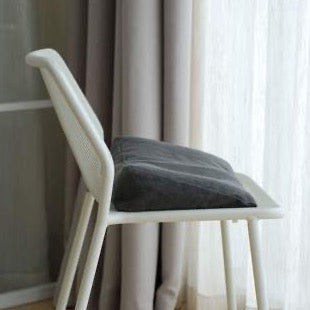 graphite buckwheat wedge cushion on a chair