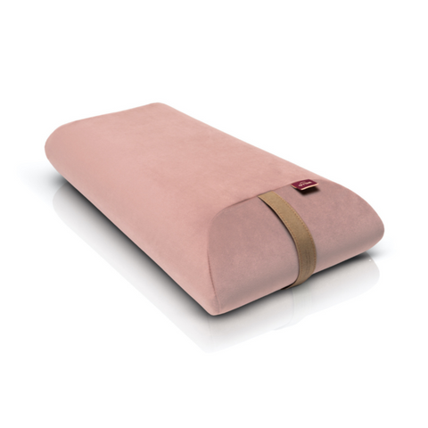 envelope pillow filled with polyurethane foam in a light pink velour cover