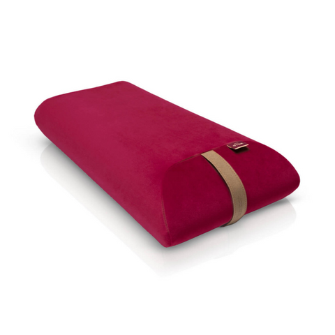 envelope pillow filled with polyurethane foam in a raspberry pink velour cover