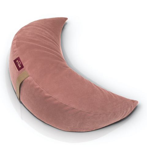 buckwheat half-moon cushion in a dark pink velour cover